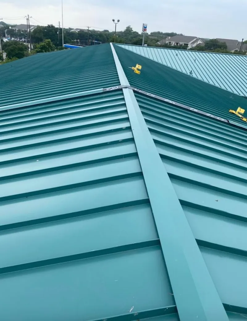 Green commercial metal roof ridge and valley for Metal Roof Repair in North Hanover